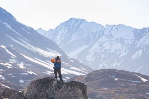 Expedition staff standing in Arctic landscape