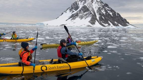 Passengers paddling in the Antarctic