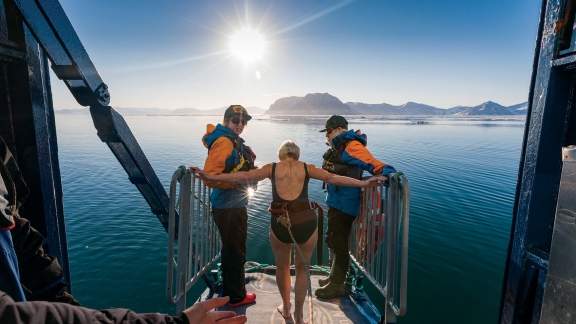 Passenger getting ready for a polar plunge in the Arctic
