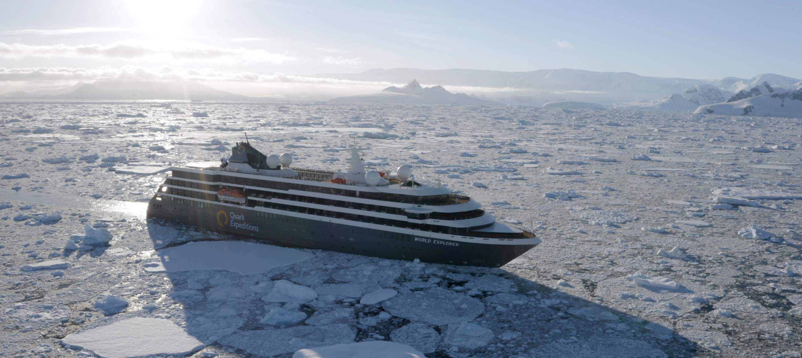 World Explorer cruising through sea ice in the Antarctic Peninsula. 